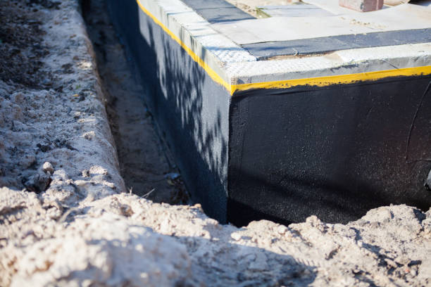 Professional Interior Drainage System technician working in Juliustown, NJ